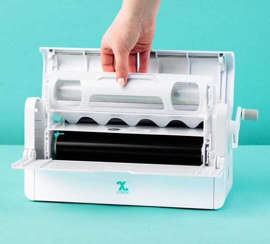 Load image into Gallery viewer, Xyron Creative Station Single Laminate With Magnetic-Back Refill Cartridge 3.5m